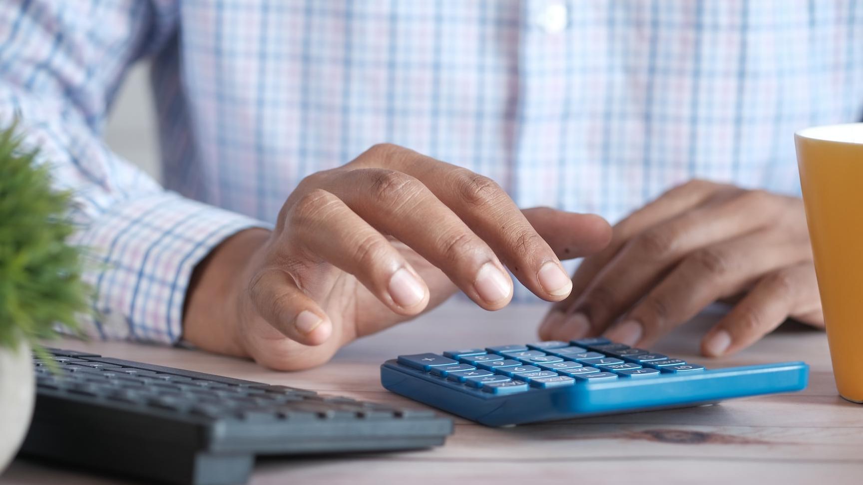 person using black computer keyboard