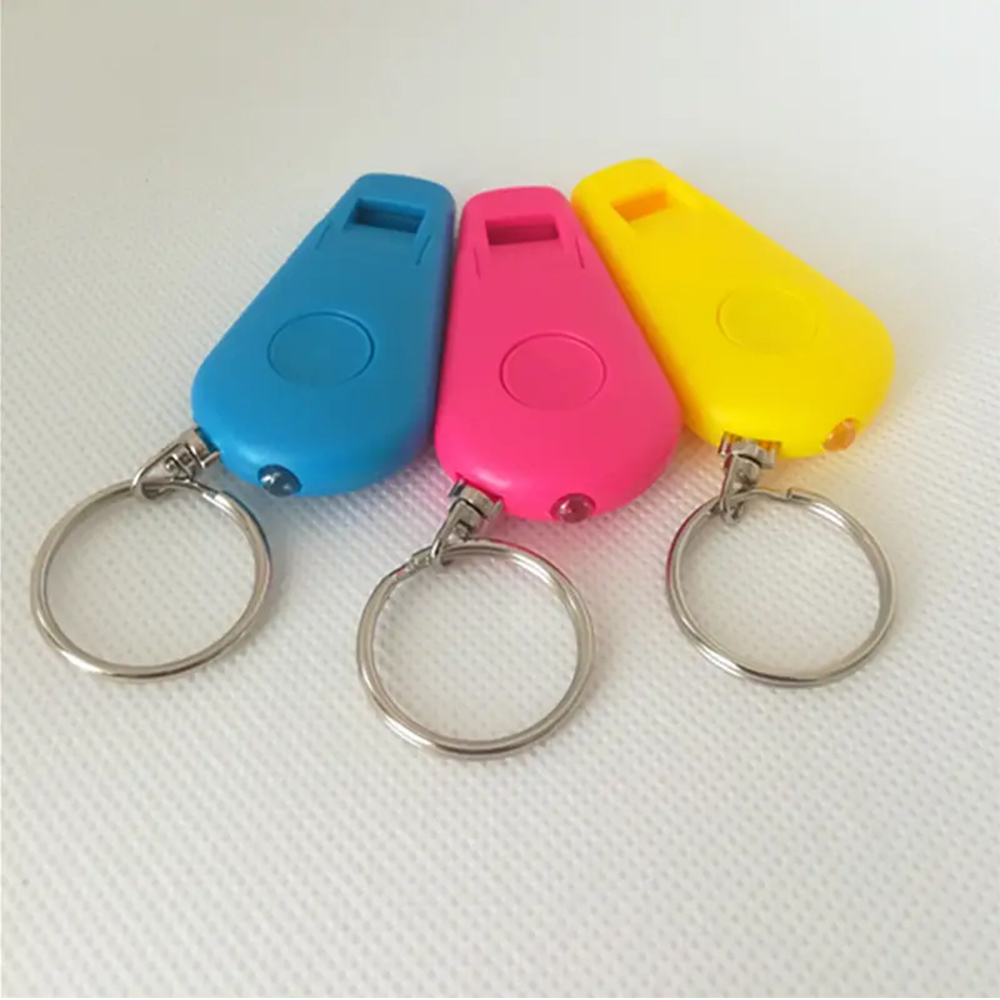 Magic Flashlight Whistle Keychain